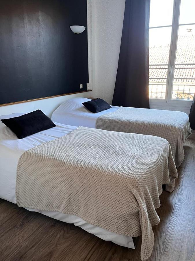 Hotel Du Pot D'Etain ชาลงส์-อ็อง-ชองปาญ ภายนอก รูปภาพ